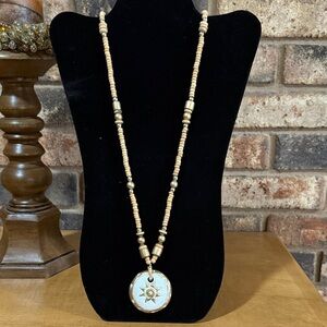 Vintage clay sun pendant and wooden beaded necklace